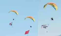 Fethiye'de THK paramotor ekibi "Milli Gururumuz TUSAŞ" yazılı pankartla uçuş yaptı