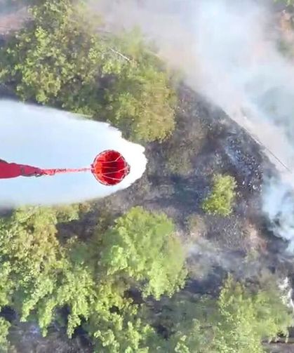 Ula'daki yangın, ormana sıçramadan söndürüldü